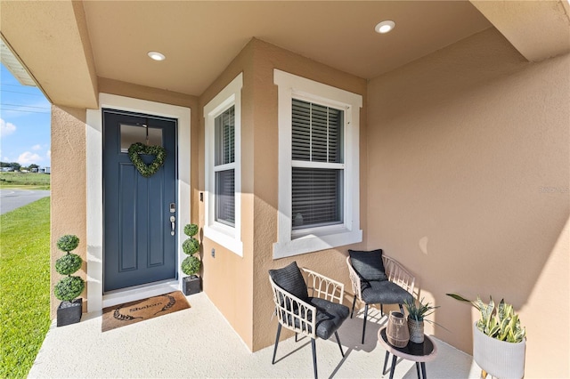 3279 Canna Lily Pl, Clermont, FL 34711 - view of exterior entry with stucco siding