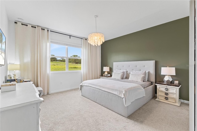 3279 Canna Lily Pl, Clermont, FL 34711 - bedroom with light carpet and a chandelier