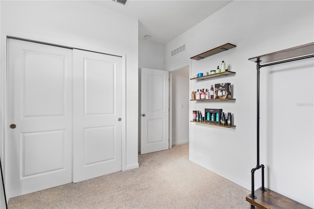 3279 Canna Lily Pl, Clermont, FL 34711 - unfurnished bedroom featuring carpet flooring and a closet