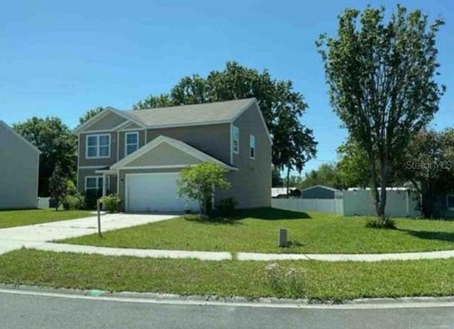 768 Constitution Pl, Macclenny, FL 32063 - view of front facade featuring driveway and an attached garage