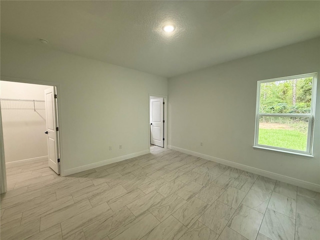 3551 W Fleece Dr, Dunnellon, FL 34433 - spare room with baseboards
