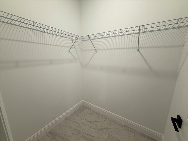 3551 W Fleece Dr, Dunnellon, FL 34433 - spacious closet featuring light marble finish flooring