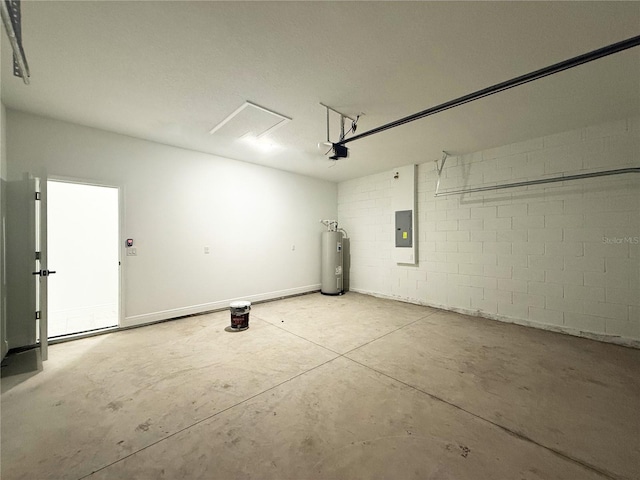 3551 W Fleece Dr, Dunnellon, FL 34433 - garage with electric water heater, electric panel, concrete block wall, and a garage door opener