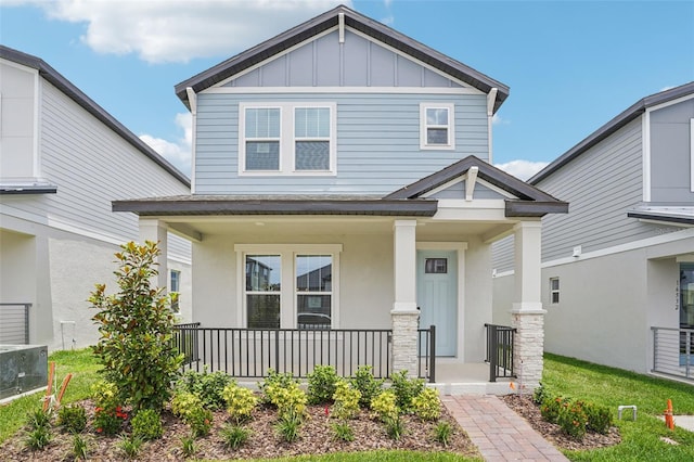 16526 Silver Brook Way, Winter Garden, FL 34787 - craftsman-style home with a porch, board and batten siding, and stucco siding