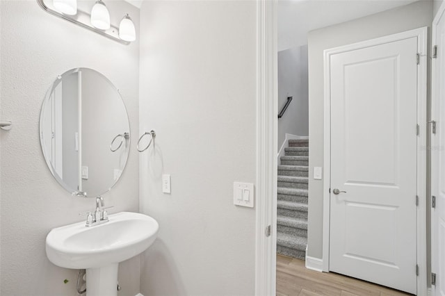 16526 Silver Brook Way, Winter Garden, FL 34787 - bathroom featuring wood finished floors and a sink