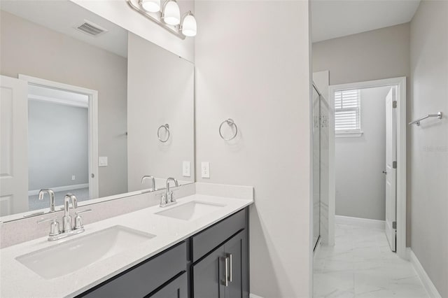 16526 Silver Brook Way, Winter Garden, FL 34787 - bathroom with marble finish flooring, double vanity, and a stall shower
