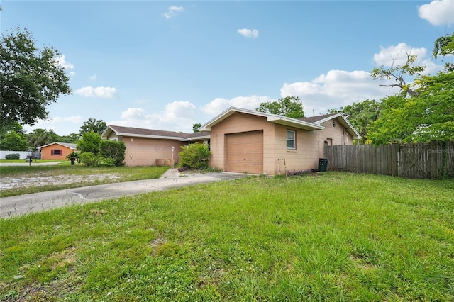 2020 Cocos Ct, Winter Park, FL 32792 - view of front facade with a garage and concrete driveway