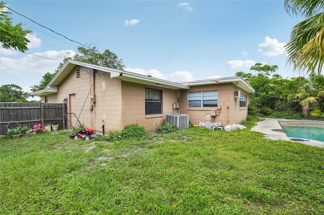2020 Cocos Ct, Winter Park, FL 32792 - rear view of property featuring concrete block siding