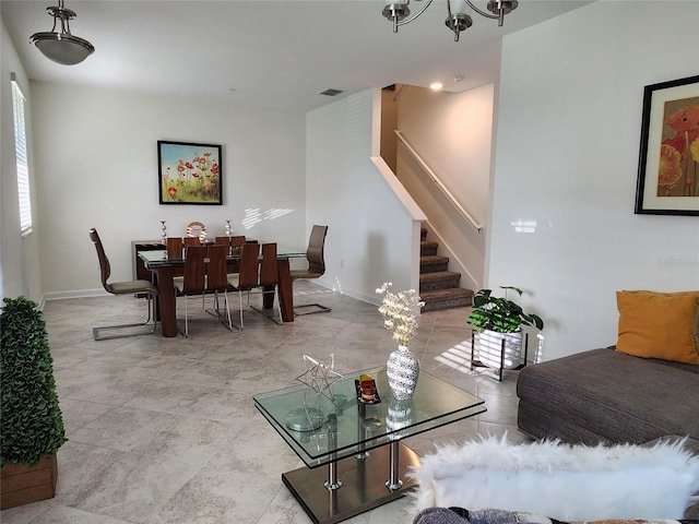 11802 Pulitzer Pl, Orlando, FL 32832 - living room featuring stairs and baseboards