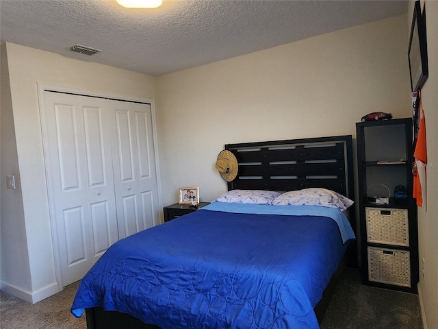 11802 Pulitzer Pl, Orlando, FL 32832 - carpeted bedroom featuring a closet and a textured ceiling