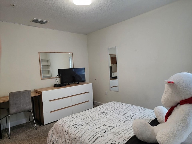 11802 Pulitzer Pl, Orlando, FL 32832 - bedroom with carpet flooring and a textured ceiling