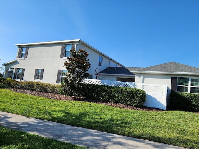 11802 Pulitzer Pl, Orlando, FL 32832 - view of property exterior with stucco siding