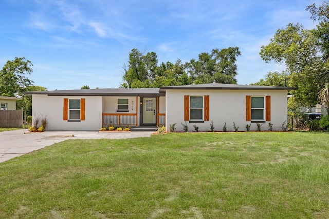 4714 Abaca St, Orlando, FL 32808 - single story home featuring stucco siding and covered porch