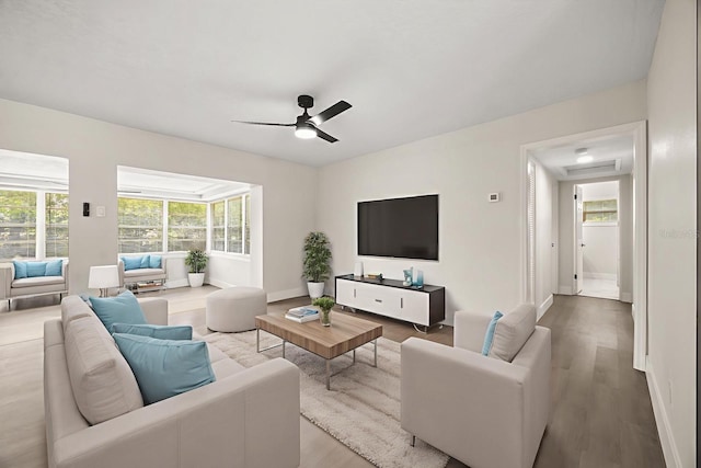 4714 Abaca St, Orlando, FL 32808 - living room featuring wood finished floors and a ceiling fan