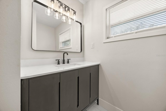 4714 Abaca St, Orlando, FL 32808 - bathroom featuring vanity and baseboards