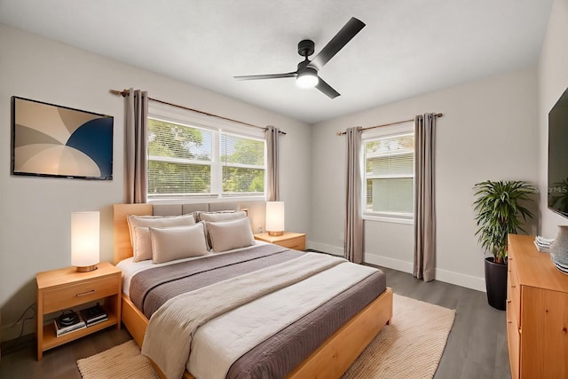 4714 Abaca St, Orlando, FL 32808 - bedroom featuring dark wood-style floors and ceiling fan