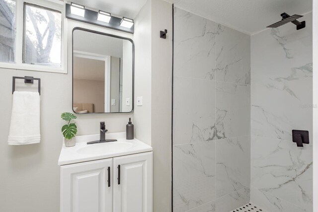 709 1st Ave NE, Largo, FL 33770 - full bath with vanity and a marble finish shower