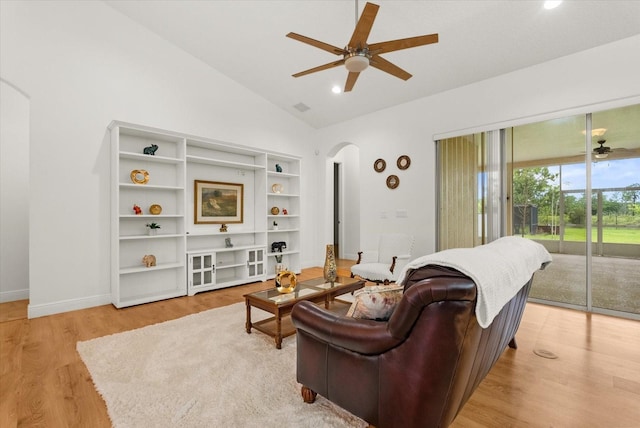 18920 Overton St, Orlando, FL 32833 - living area featuring arched walkways, a ceiling fan, light wood-style floors, lofted ceiling, and recessed lighting