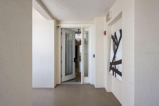 111 E Monument Ave Unit 801, Kissimmee, FL 34741 - hall featuring a chandelier