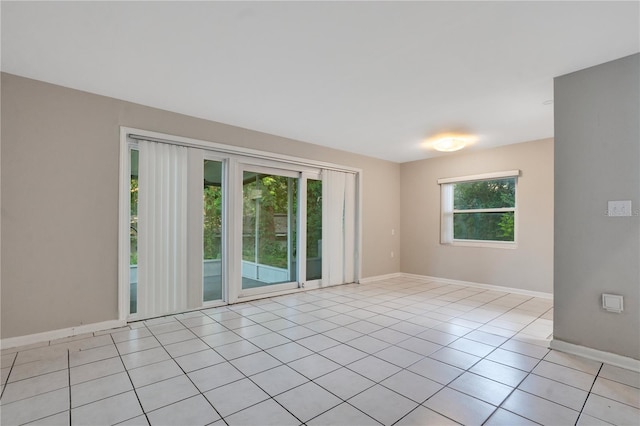 1630 Lakeview Ct, Eustis, FL 32726 - unfurnished room featuring baseboards and light tile patterned floors