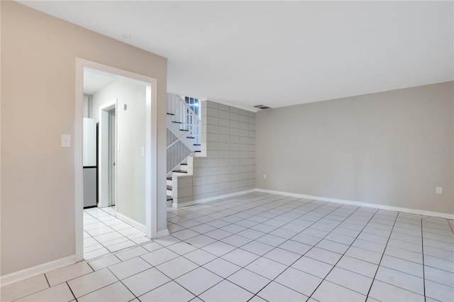 1630 Lakeview Ct, Eustis, FL 32726 - spare room with light tile patterned floors and stairway
