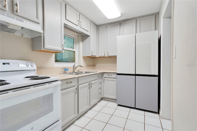 1630 Lakeview Ct, Eustis, FL 32726 - kitchen with white appliances, under cabinet range hood, light countertops, and light tile patterned flooring