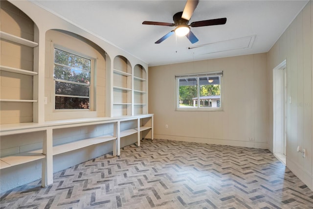 1630 Lakeview Ct, Eustis, FL 32726 - unfurnished office featuring a ceiling fan and built in shelves
