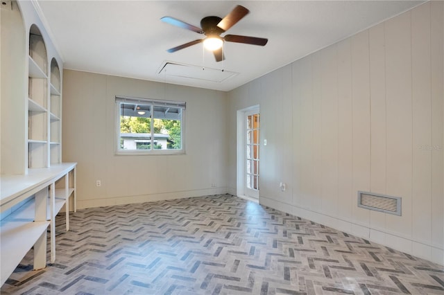 1630 Lakeview Ct, Eustis, FL 32726 - spare room with attic access and a ceiling fan