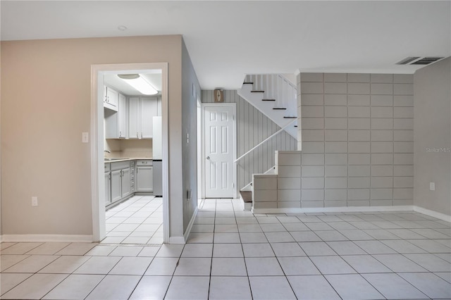 1630 Lakeview Ct, Eustis, FL 32726 - stairway featuring tile patterned flooring and baseboards