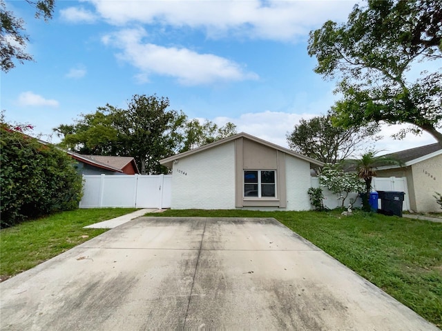 10344 Rosemount Dr, Tampa, FL 33624 - back of property with brick siding