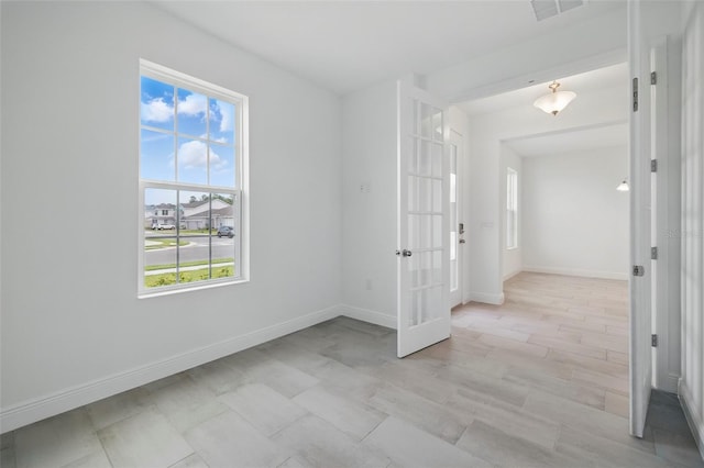 5204 Obsidian Gate Dr, Mount Dora, FL 32757 - empty room with french doors and baseboards