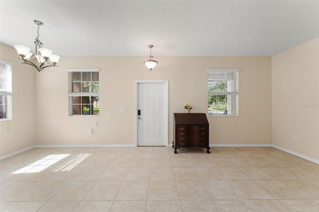 14897 Evergreen Oak Loop, Winter Garden, FL 34787 - foyer entrance featuring a chandelier and light tile patterned floors