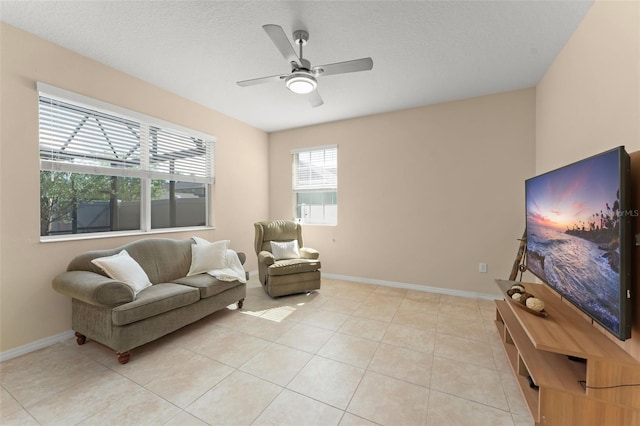 14897 Evergreen Oak Loop, Winter Garden, FL 34787 - sitting room with a ceiling fan, light tile patterned floors, and a textured ceiling