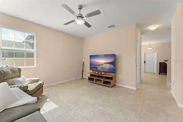 14897 Evergreen Oak Loop, Winter Garden, FL 34787 - living room with light tile patterned flooring and ceiling fan