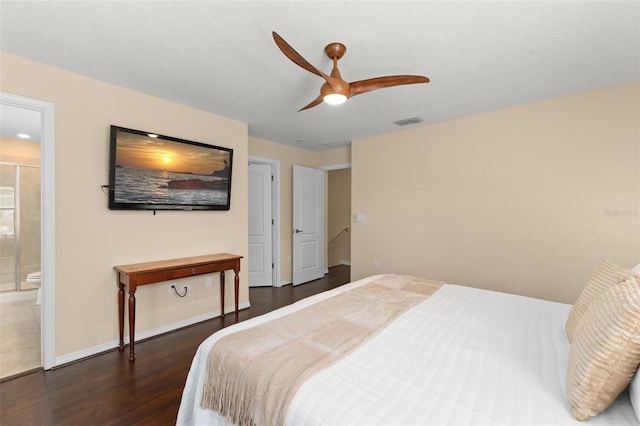 14897 Evergreen Oak Loop, Winter Garden, FL 34787 - bedroom featuring dark wood-type flooring, a ceiling fan, and ensuite bath