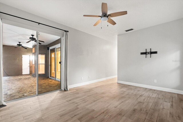 917 Southern Oak Ln, Apopka, FL 32712 - empty room featuring ceiling fan and light wood-style flooring