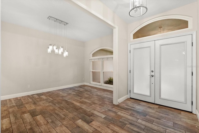917 Southern Oak Ln, Apopka, FL 32712 - entryway featuring a chandelier and wood finished floors