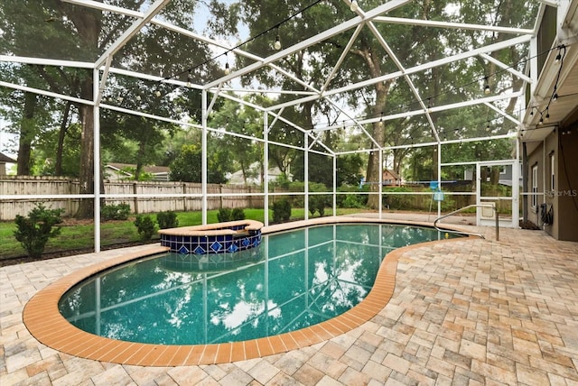 917 Southern Oak Ln, Apopka, FL 32712 - view of swimming pool with a hot tub, a patio, and glass enclosure