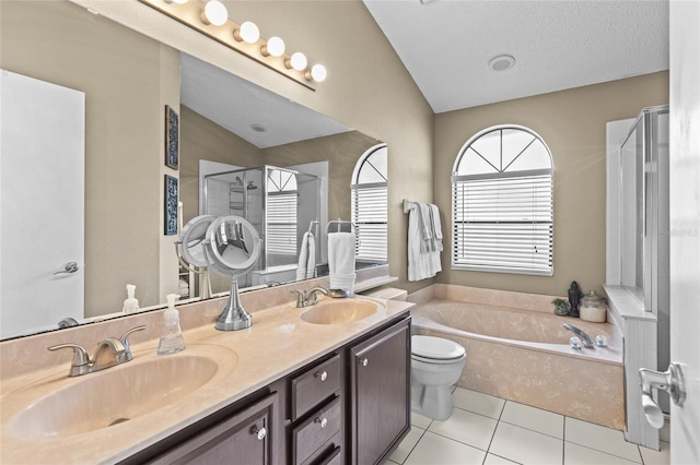 2737 Cahill Way, Lake Mary, FL 32746 - bathroom with a garden tub, a shower stall, double vanity, and tile patterned flooring