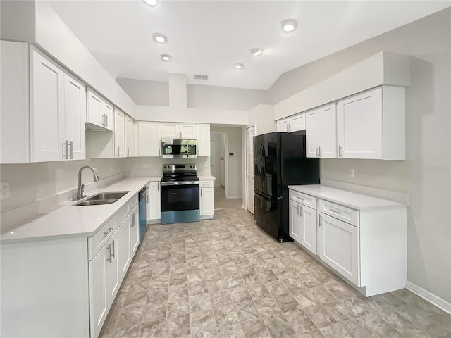 6740 Odoniel Loop W, Lakeland, FL 33809 - kitchen with stainless steel appliances, light countertops, white cabinets, and recessed lighting