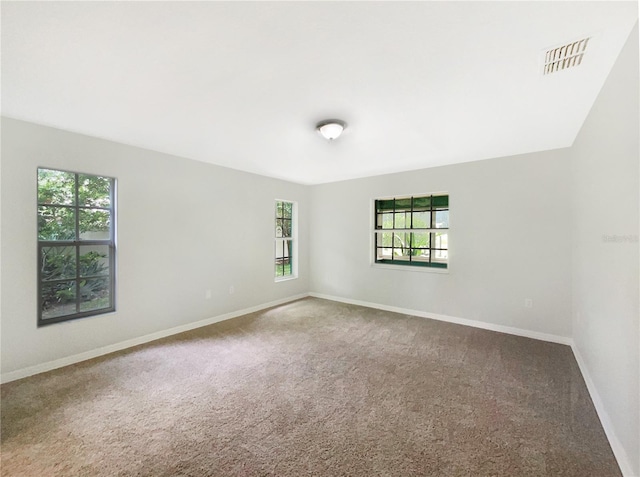 6740 Odoniel Loop W, Lakeland, FL 33809 - spare room featuring carpet floors and baseboards