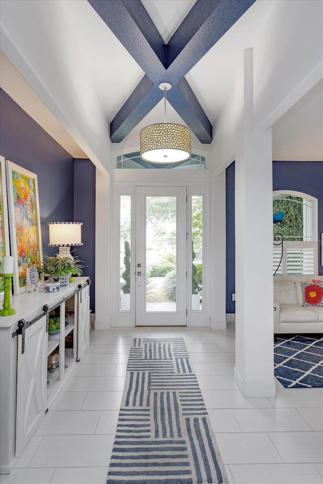 2440 Pawtucket Pass, Mount Dora, FL 32757 - entrance foyer with beam ceiling and light tile patterned floors