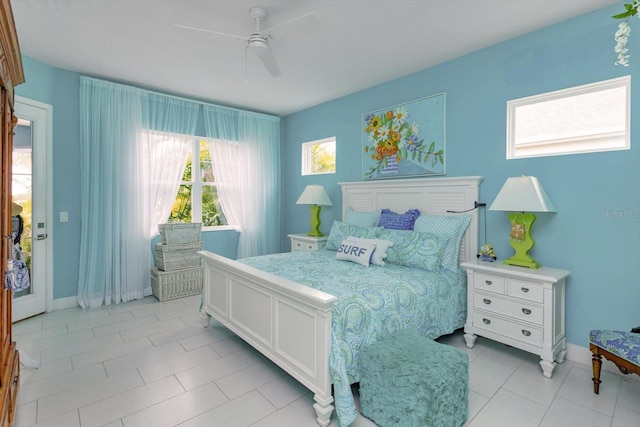 2440 Pawtucket Pass, Mount Dora, FL 32757 - bedroom featuring multiple windows, light tile patterned floors, and ceiling fan