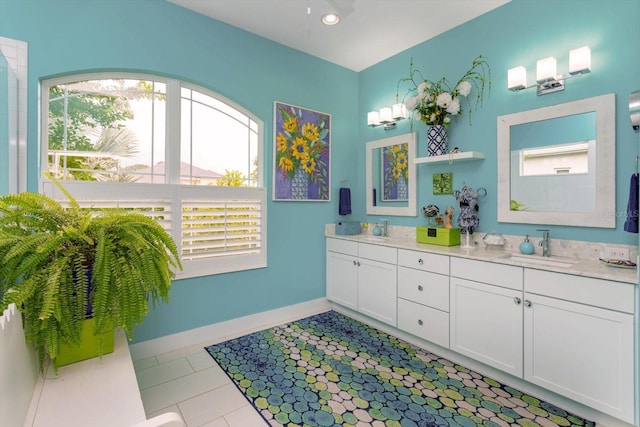 2440 Pawtucket Pass, Mount Dora, FL 32757 - full bath featuring double vanity, tile patterned floors, and recessed lighting