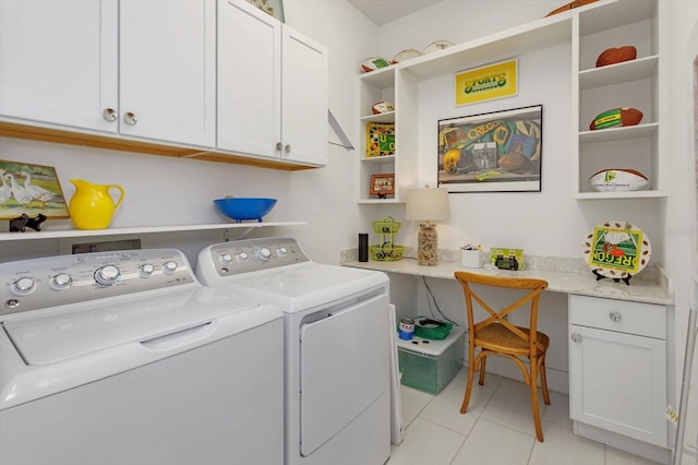 2440 Pawtucket Pass, Mount Dora, FL 32757 - washroom featuring washer and dryer, cabinet space, light tile patterned flooring, and a desk