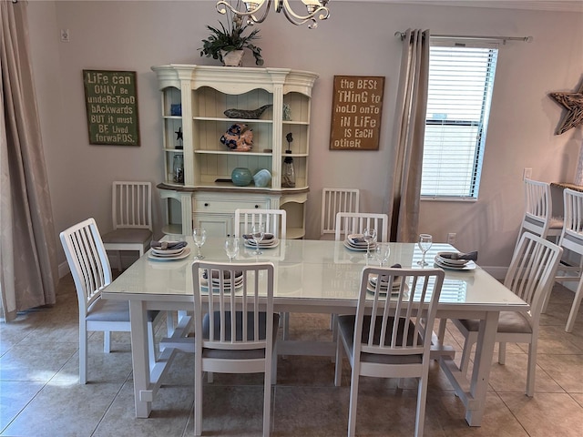 1452 Moon Valley Dr, Davenport, FL 33896 - dining area with light tile patterned floors and a chandelier
