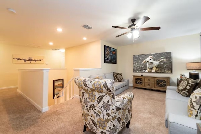 1452 Moon Valley Dr, Davenport, FL 33896 - carpeted living area featuring ceiling fan and recessed lighting