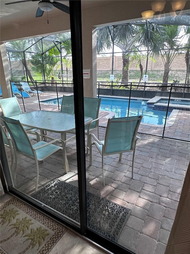 1452 Moon Valley Dr, Davenport, FL 33896 - view of pool featuring ceiling fan and a pool with connected hot tub