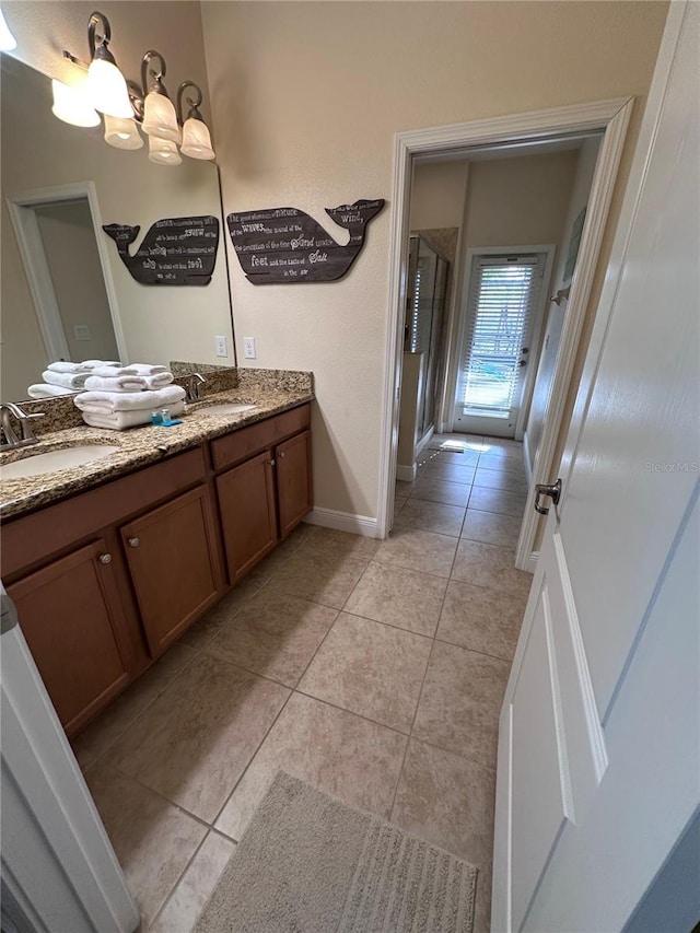 1452 Moon Valley Dr, Davenport, FL 33896 - full bath with double vanity, a stall shower, and tile patterned floors