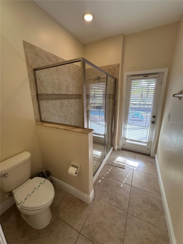 1452 Moon Valley Dr, Davenport, FL 33896 - full bathroom with a stall shower and tile patterned floors